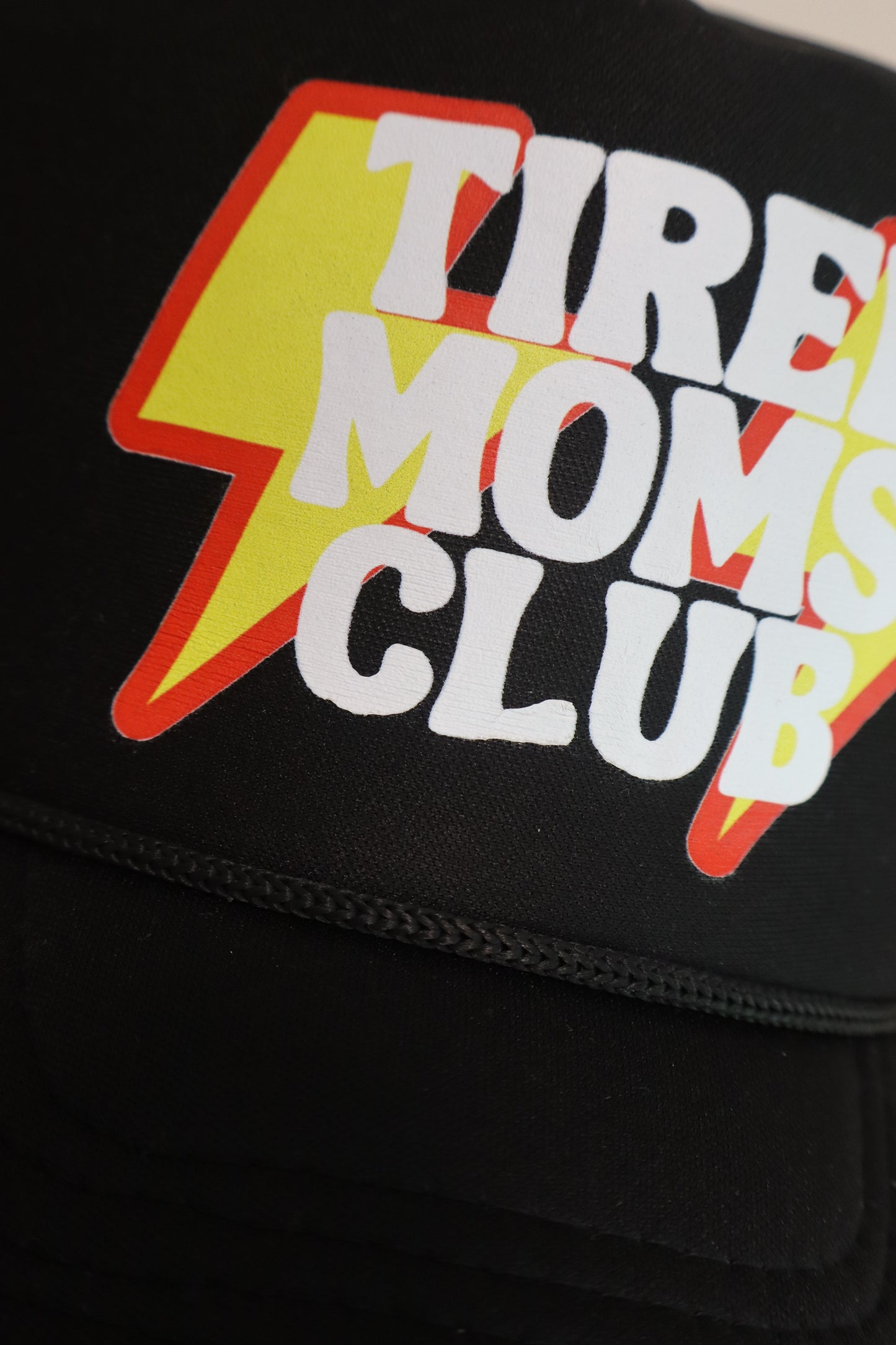 **flawed** TIRED MOMS CLUB TRUCKER