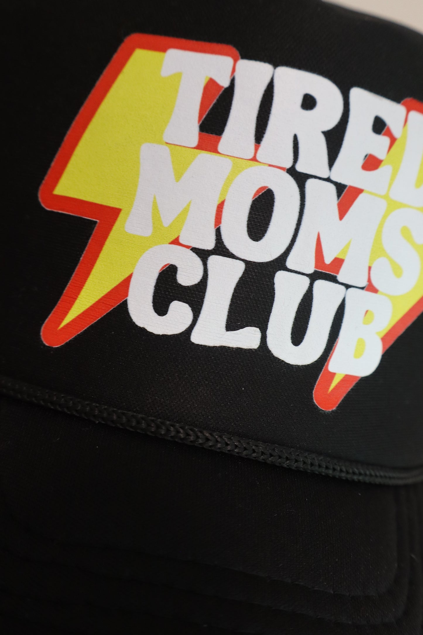 **flawed** TIRED MOMS CLUB TRUCKER