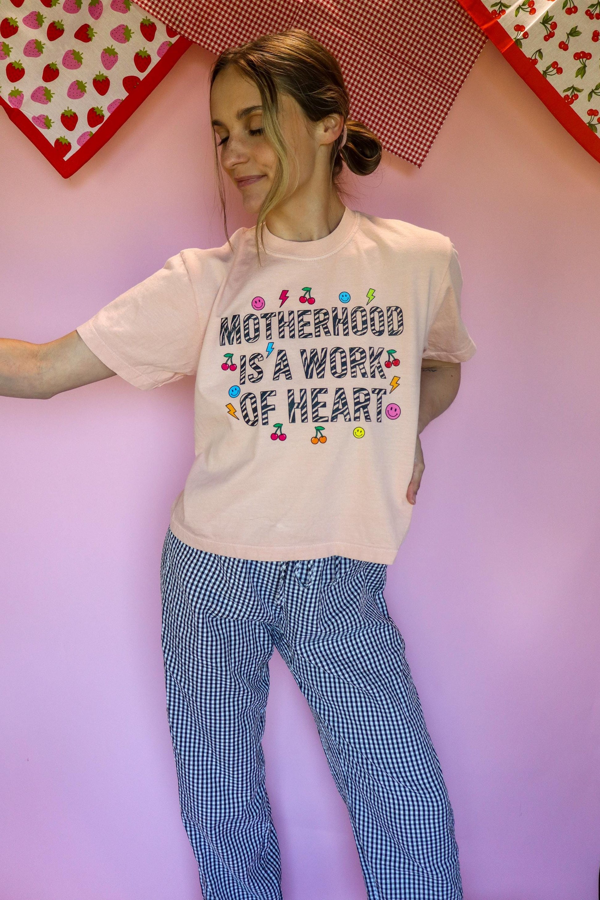 Motherhood Is a Work of Heart Shirt, Trendy Mom Tee, Cute Graphic Mom Shirt, Cherry Happy Face Shirt, Comfort Colors® Peach Tee
