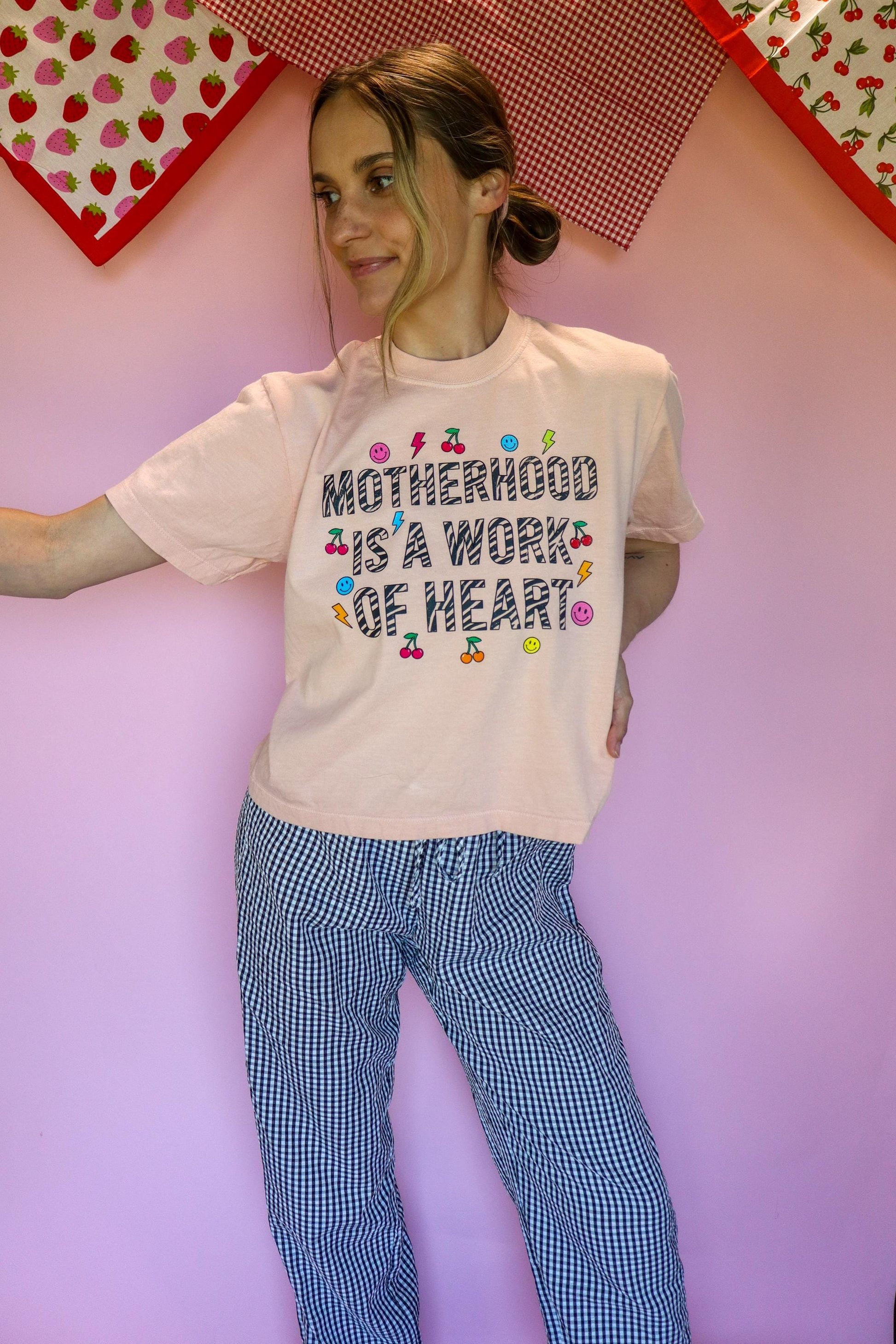 Motherhood Is a Work of Heart Shirt, Trendy Mom Tee, Cute Graphic Mom Shirt, Cherry Happy Face Shirt, Comfort Colors® Peach Tee