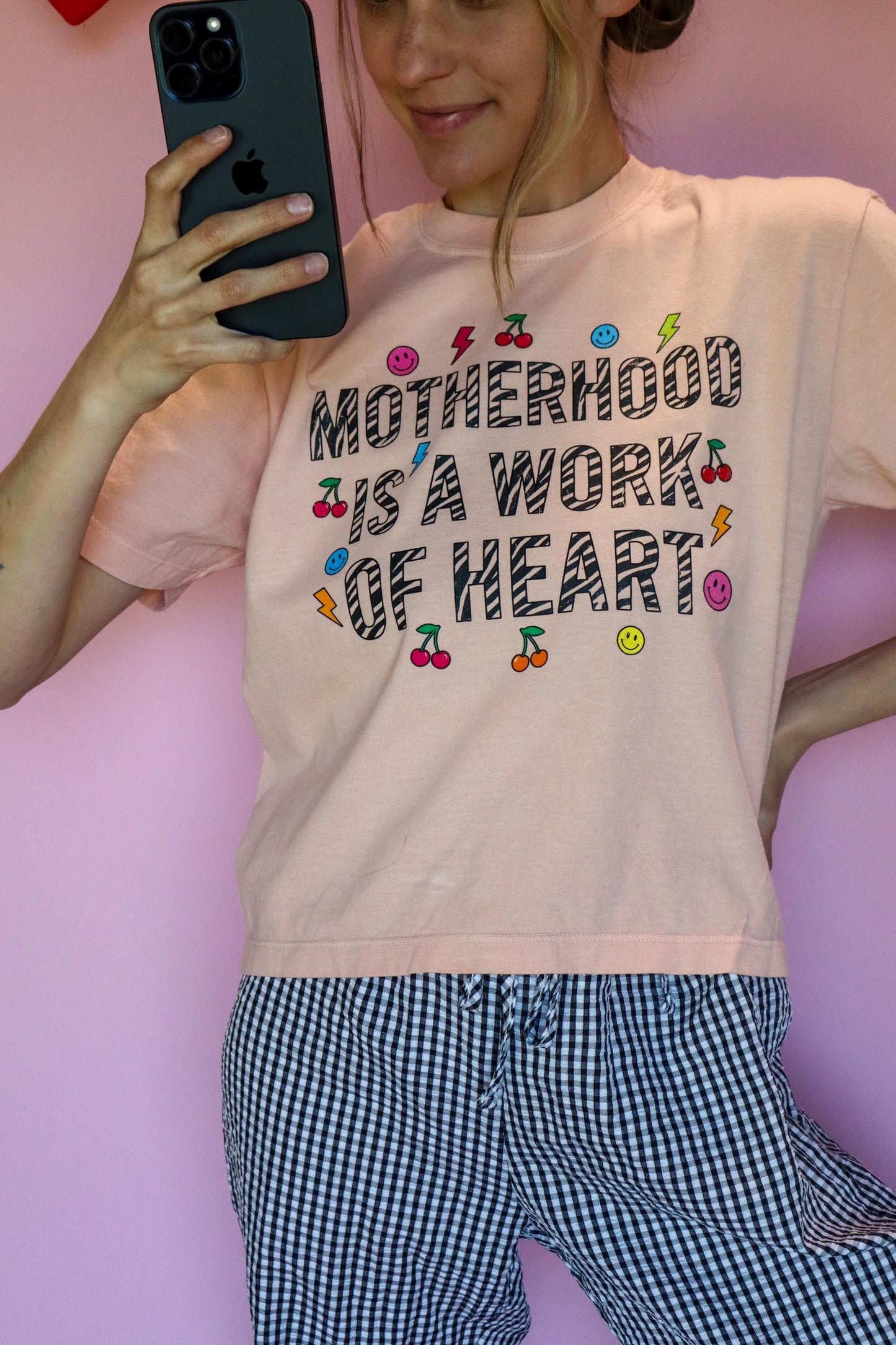 Motherhood Is a Work of Heart Shirt, Trendy Mom Tee, Cute Graphic Mom Shirt, Cherry Happy Face Shirt, Comfort Colors® Peach Tee